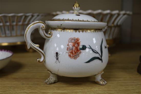 A 19th century Meissen jug and cover, cracked, 12.5cm., a Berlin gilt porcelain basket, another similar basket